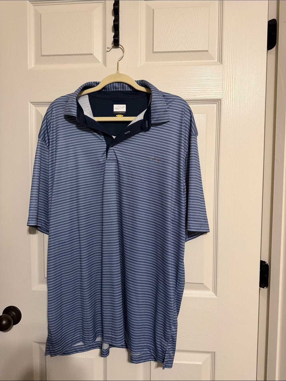 Greg Norman Light Blue Striped Polo